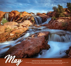 Image of waterfalls over red rock.