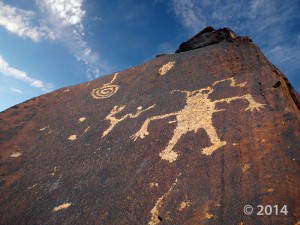 Petroglyphs carved into desert varnish-covered sandstone near Ivins, Washington County. Washington County, Utah Photographer: Mark Milligan; © 2014