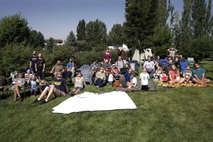 A group of people sitted watching the solar eclipse.