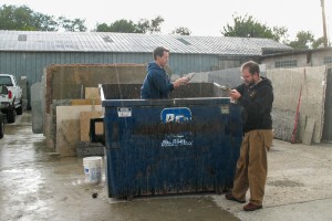 Jim Davis and Nicholas Daniels collect cut and polished rock slab samples for Earth Science Week, 2009.