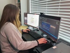 A person works on the Utah Rockhounder Web Application that highlights where to find rocks, minerals, and fossils in Utah, May 2022.
