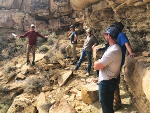A person teaches petroleum industry professionals about the Green River Formation.