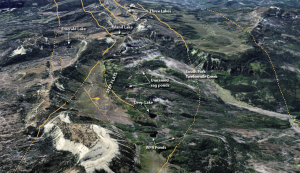 Many of the Wasatch Plateau’s lakes are visible in this aerial image looking southward along the axis of Skyline Drive east of Gunnison, Utah. Deep Lake, the WPA ponds, and many of the other unnamed lakes and ponds of the Step Flats area are sag ponds created at the head of landslides within the Twelvemile Creek drainage. Island Lake and several other small lakes along the axis of the Plateau are graben lakes bounded by normal faults. Solid and dashed orange lines are normal faults, the bar and ball symbol indicates the down-dropped side of the fault. Emerald Lake is in a Pleistocene-age glacial cirque.