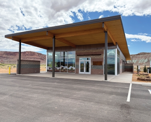 An outside view of a building with a large overhang.