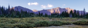 Landscape photo of Kings Peak prominently highlighted by the sunlight.