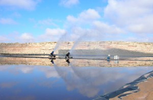 Produced water evaporation pond and spray evaporation system, Brennan Bottom disposal facility, Uintah County. Photo by Brad Hill, Utah Division of Oil, Gas & Mining.